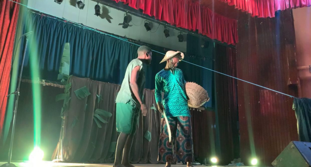 Olowu talking to his friend